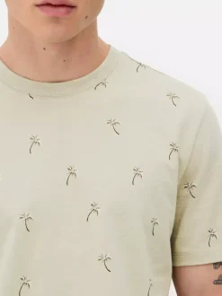 T-shirt z nadrukiem w drobne palmy