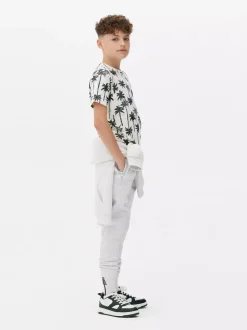 T-shirt z nadrukiem w palmy