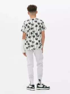 T-shirt z nadrukiem w palmy