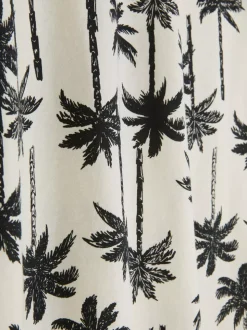 T-shirt z nadrukiem w palmy