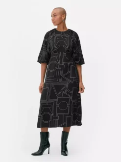 Wzorzysta sukienka midi