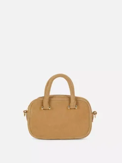 Zamszowa minitorebka typu kuferek Rita Ora