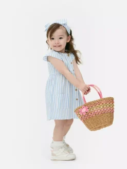 Zestaw z sukienką w paski i kokardką