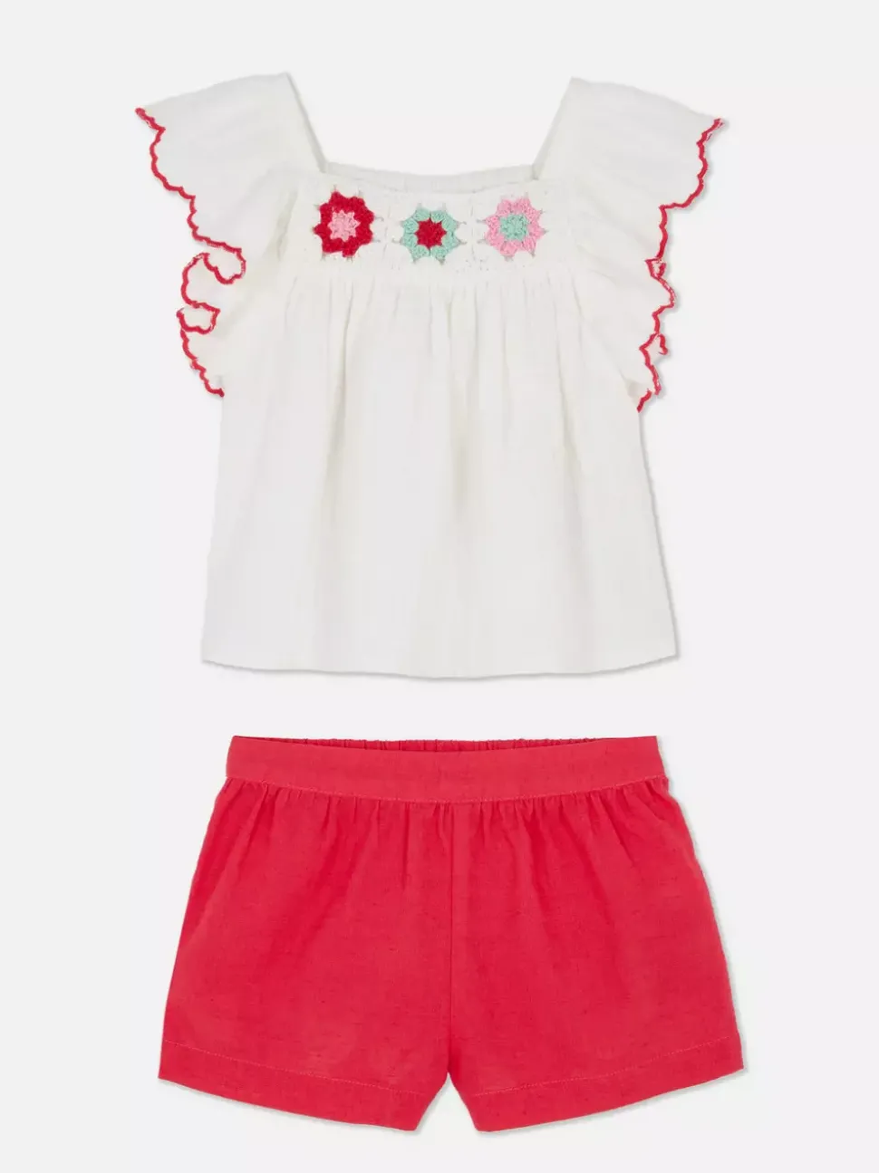 Zestaw z szydełkową bluzką i szortami